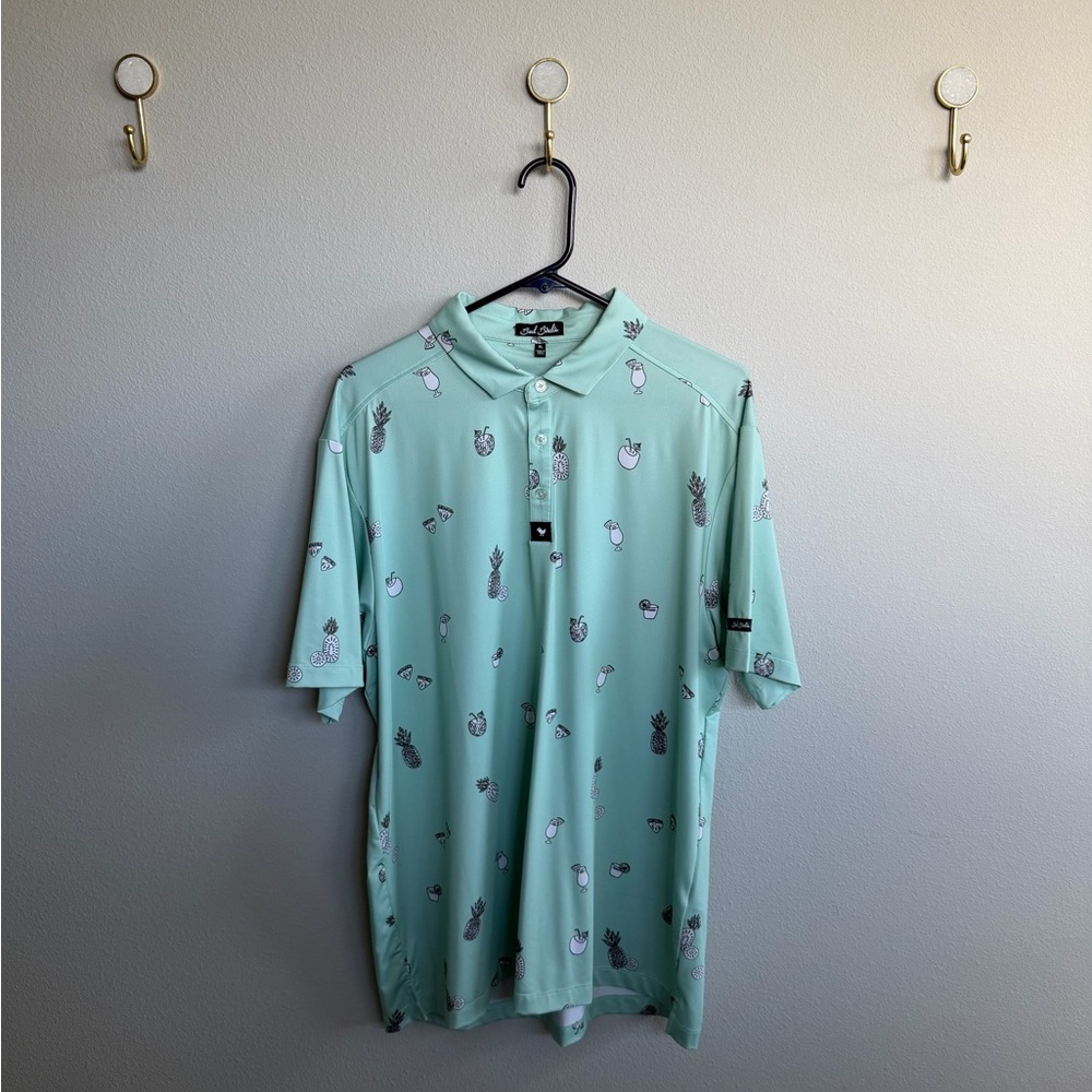 Bad Birdie Mint Polo with Pineapple Design
